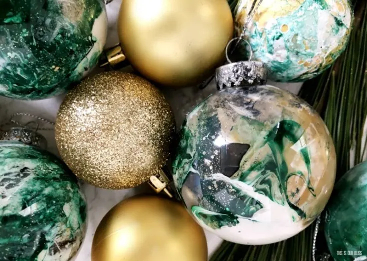 DIY Snow Globe Ornament - Fill a clear ornament with a bottle brush tree!