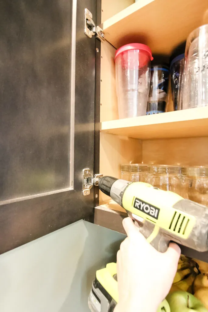 removing kitchen cabinet hardware with a drill