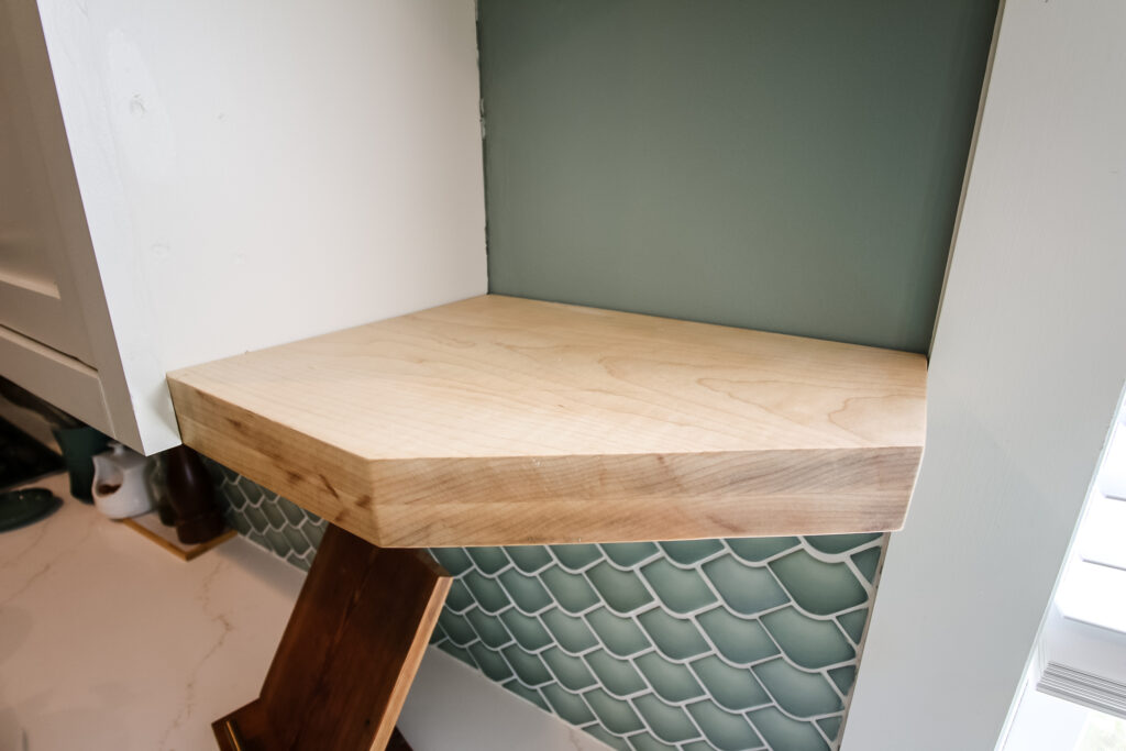 Floating shelf in kitchen