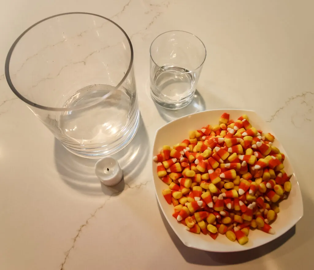 supplies to make a candy corn candle holder