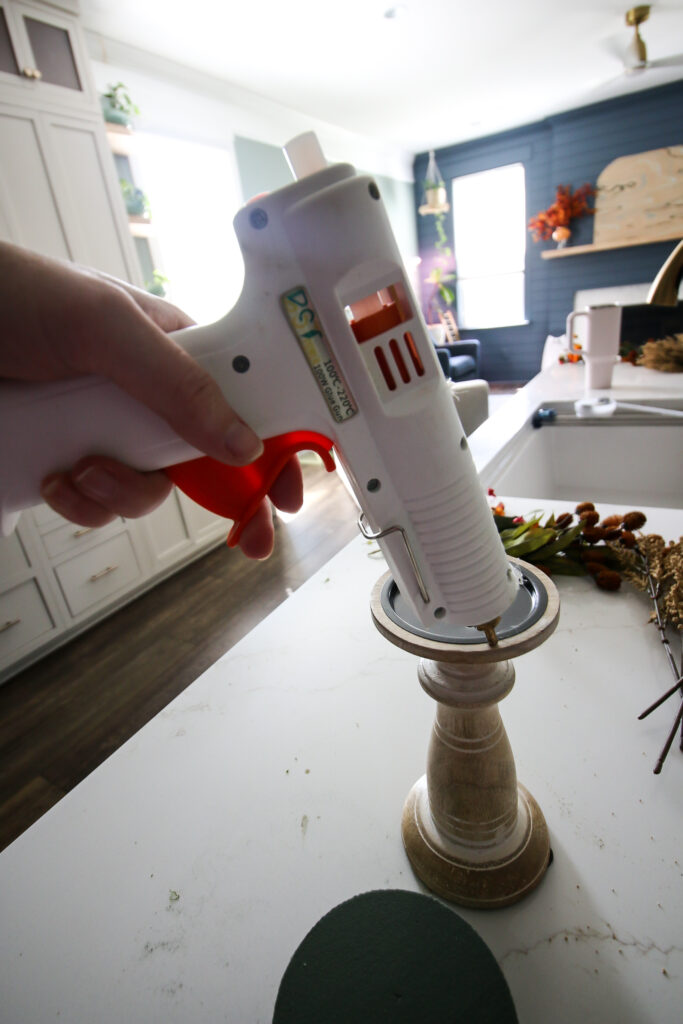 hot glue floral foam on top of candlestick