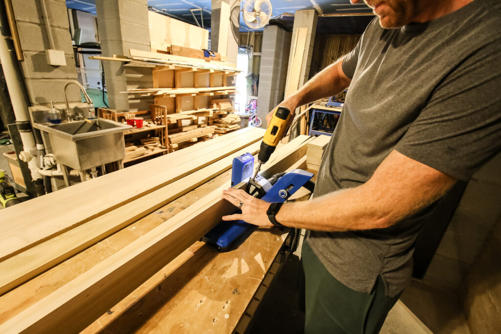 Drilling pocket holes on long board