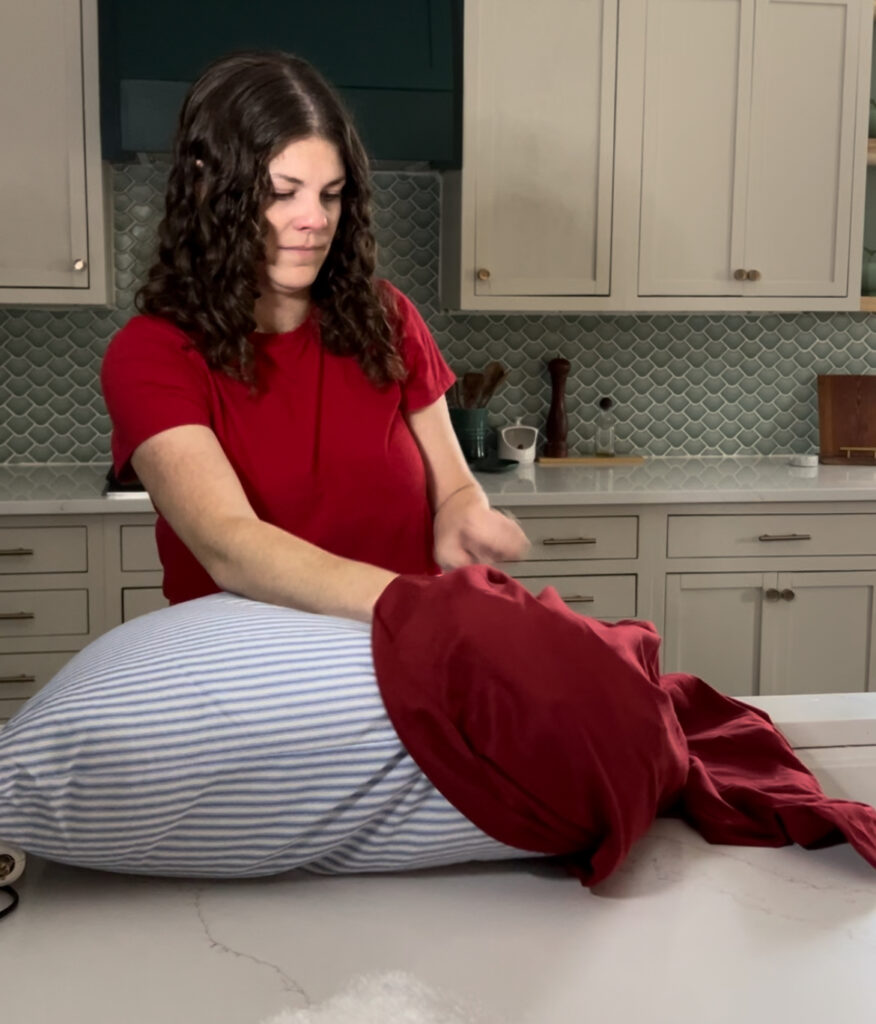 putting pillow in a pillow case