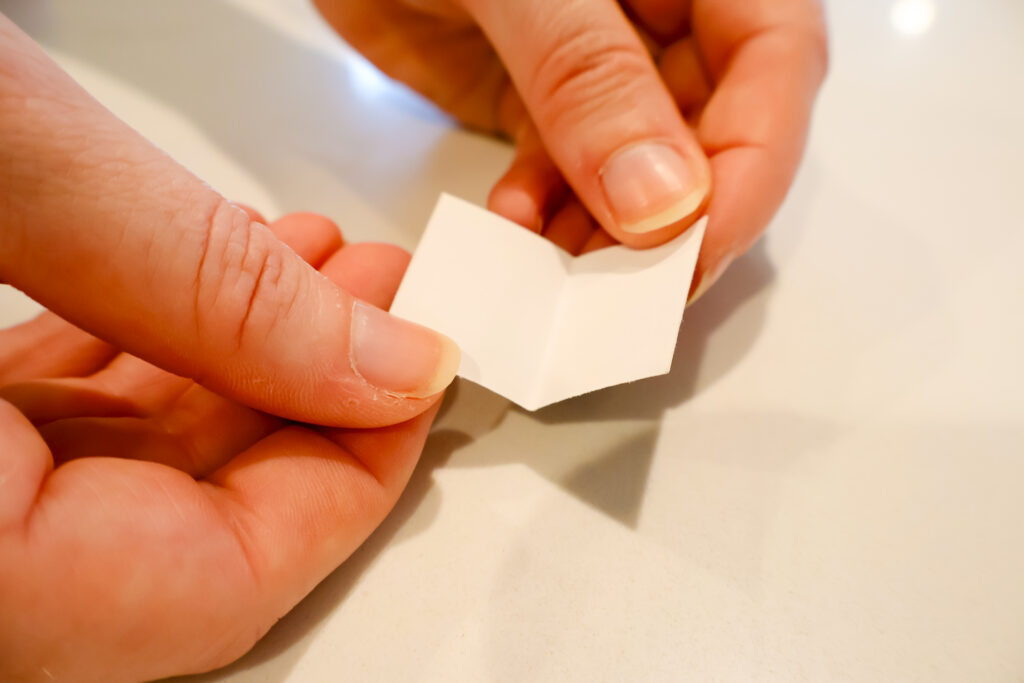 folding paper books for an ornament