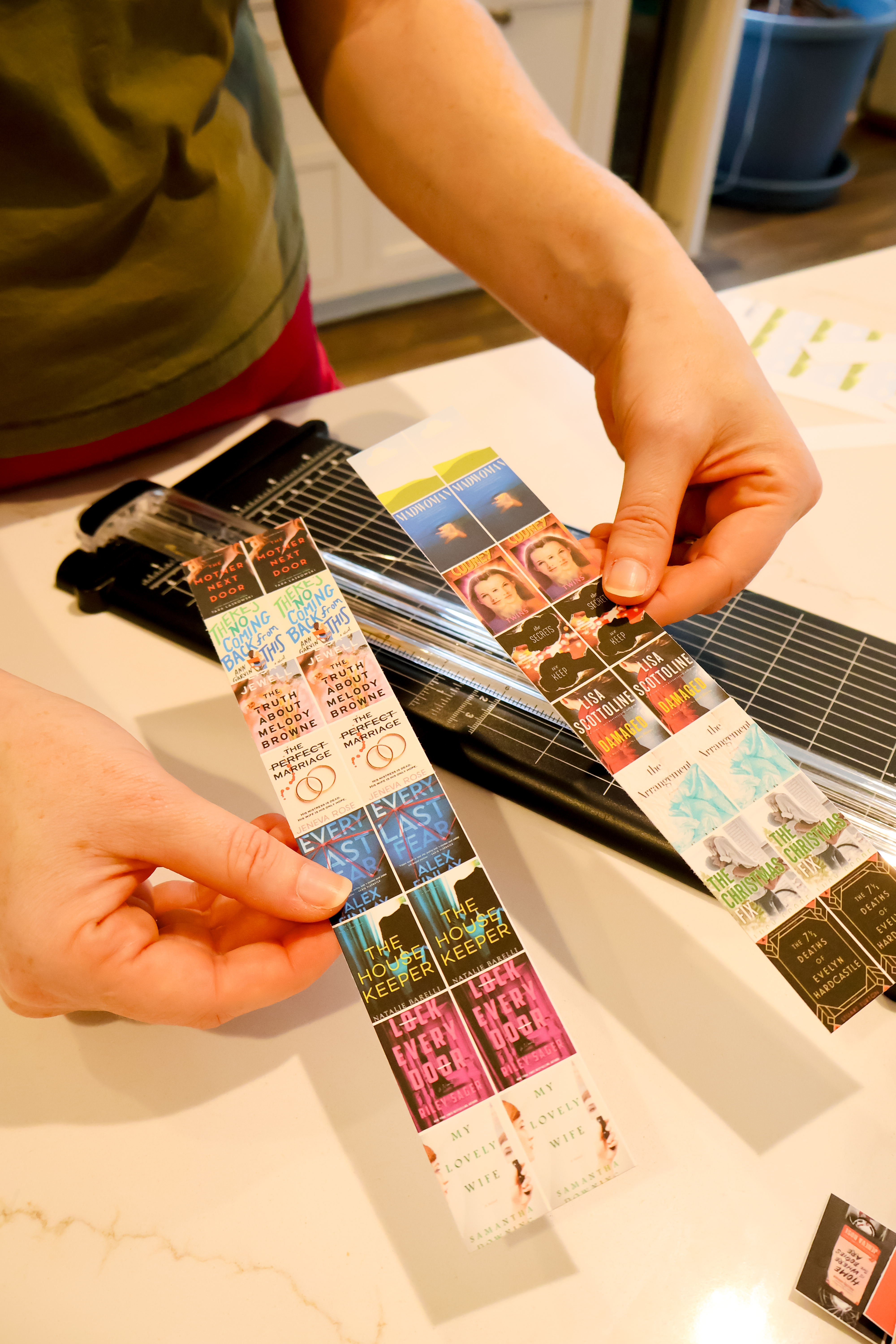 cutting out paper books for keepsake ornament