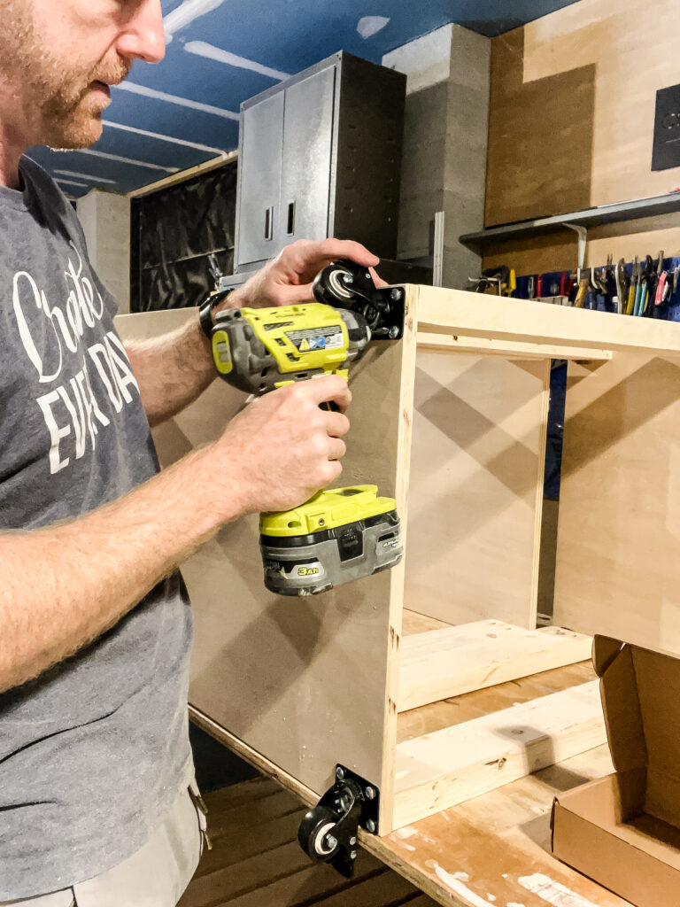 Attaching casters to mobile planer table