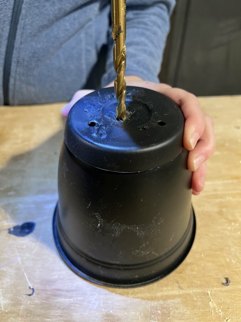 drilling hole in plastic pot