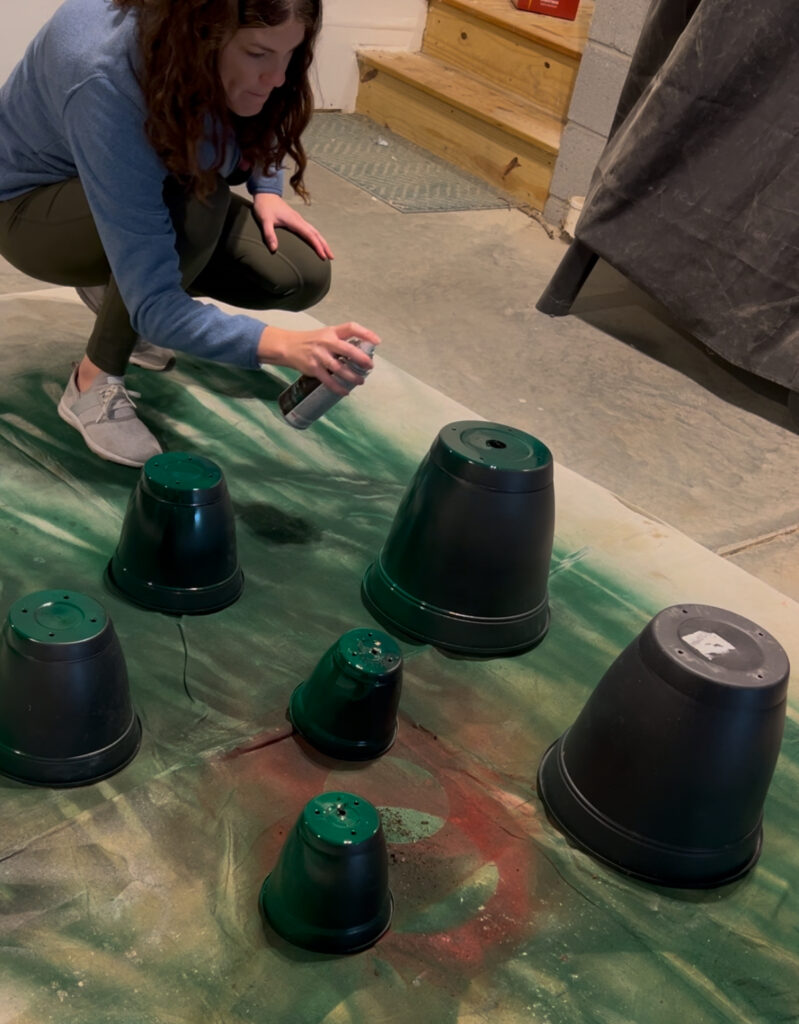 spray painting pots green