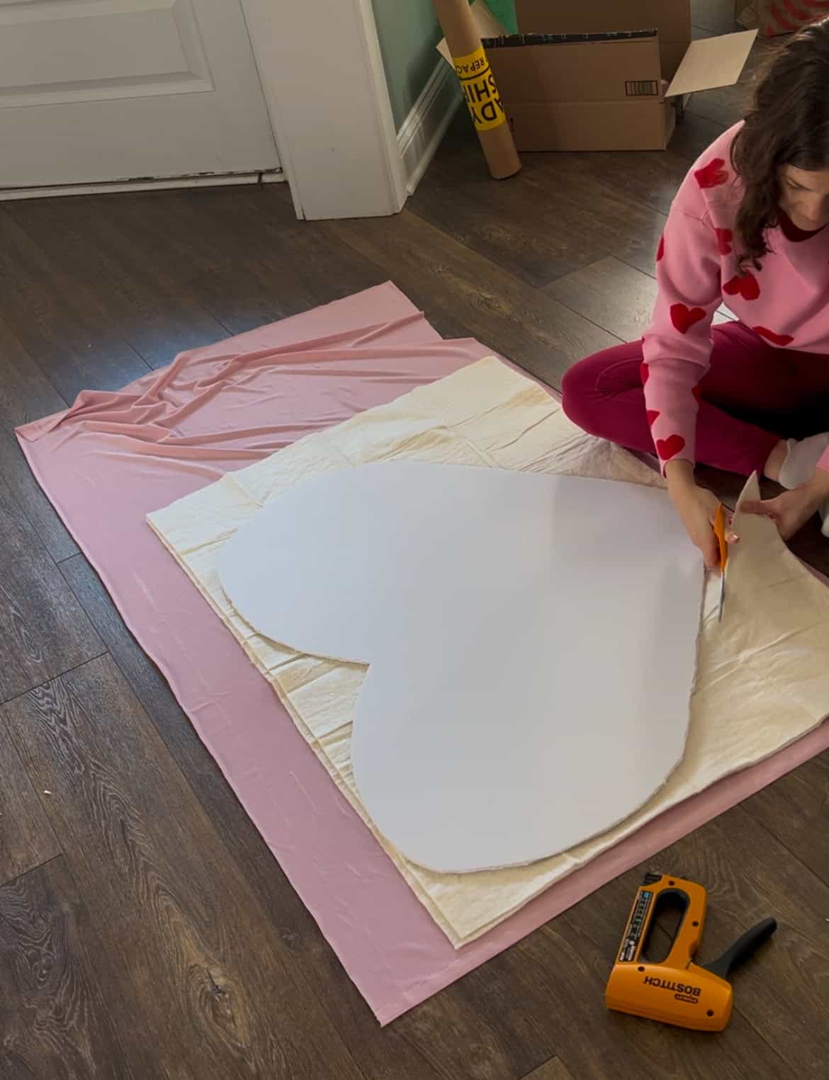 laying out fabric for making giant heart