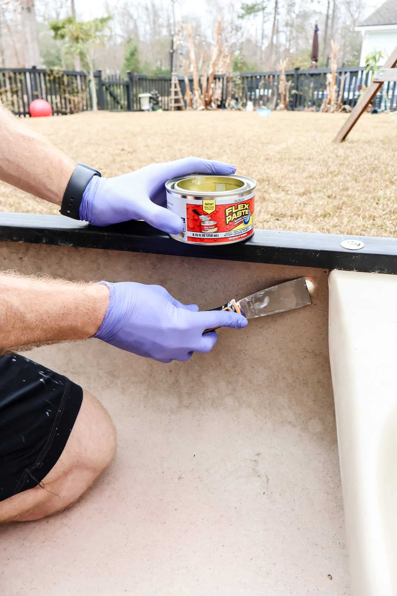 Repairing hole on inside of canoe with Flex Paste