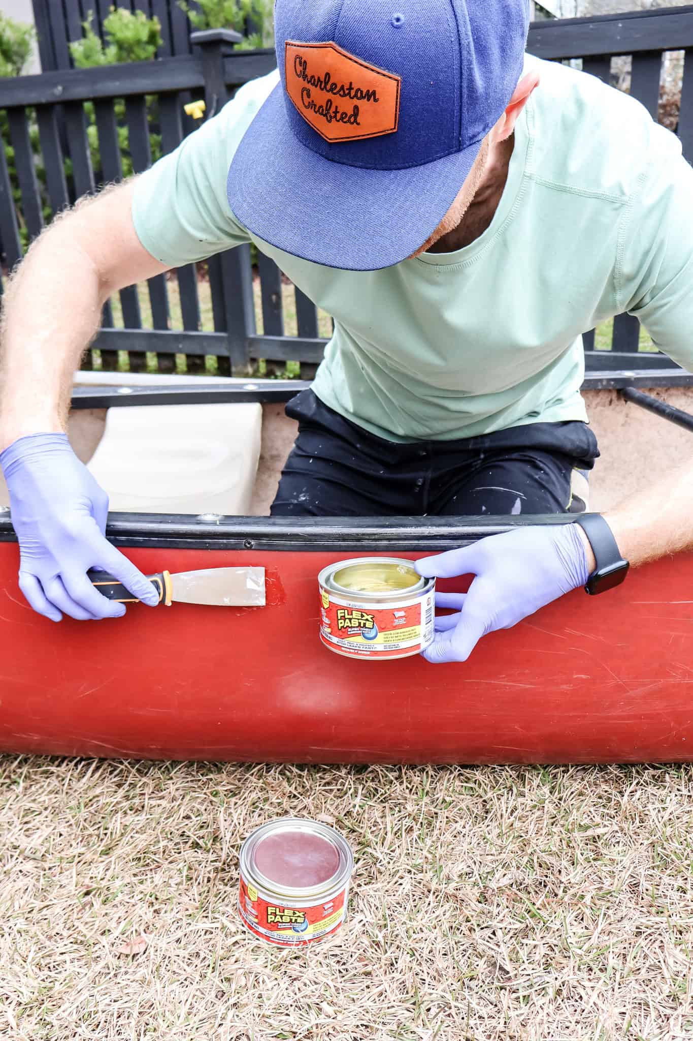 Pressing Flex Paste into canoe hole