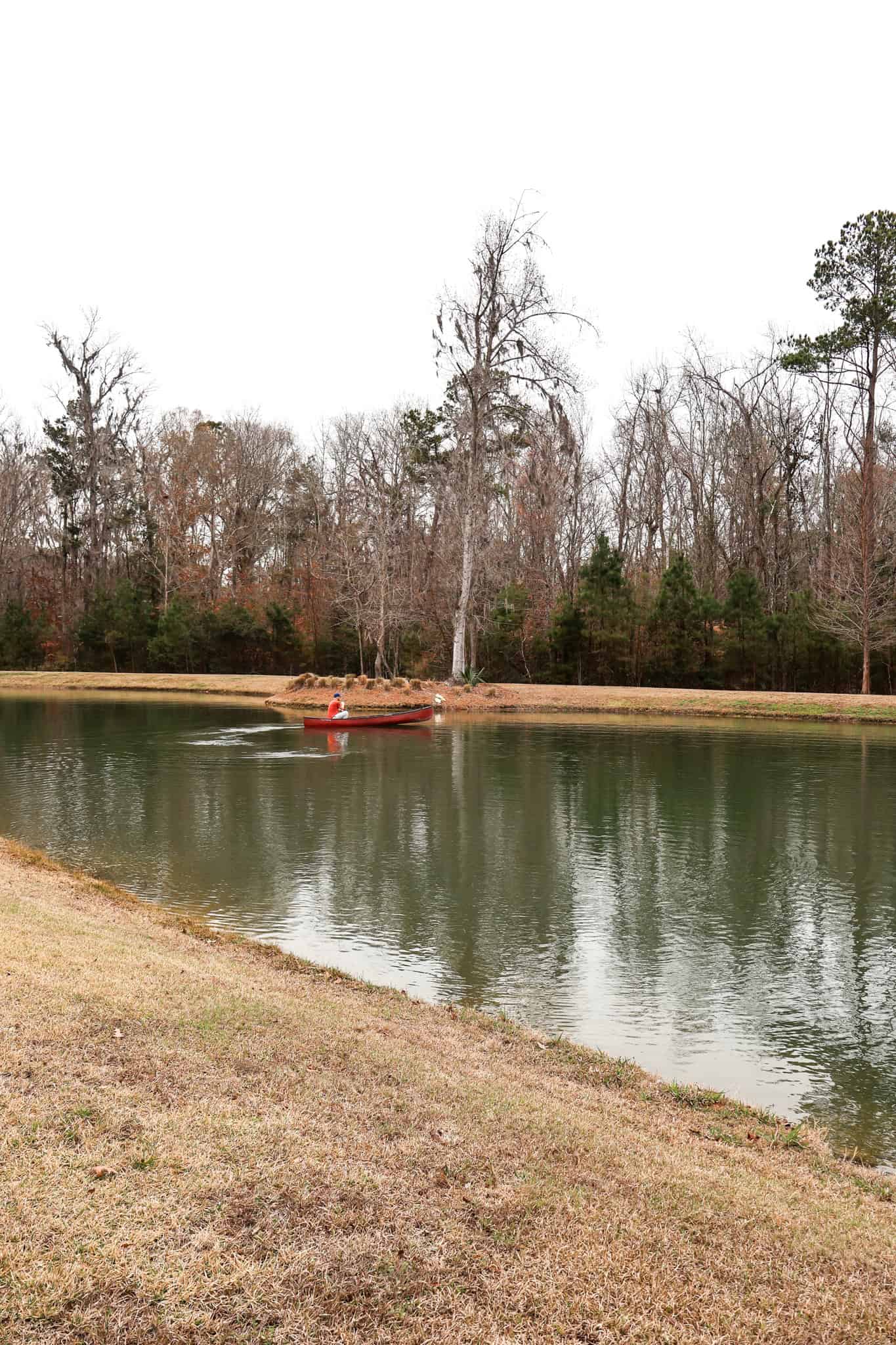 Canoeing in pond with repaired canoe