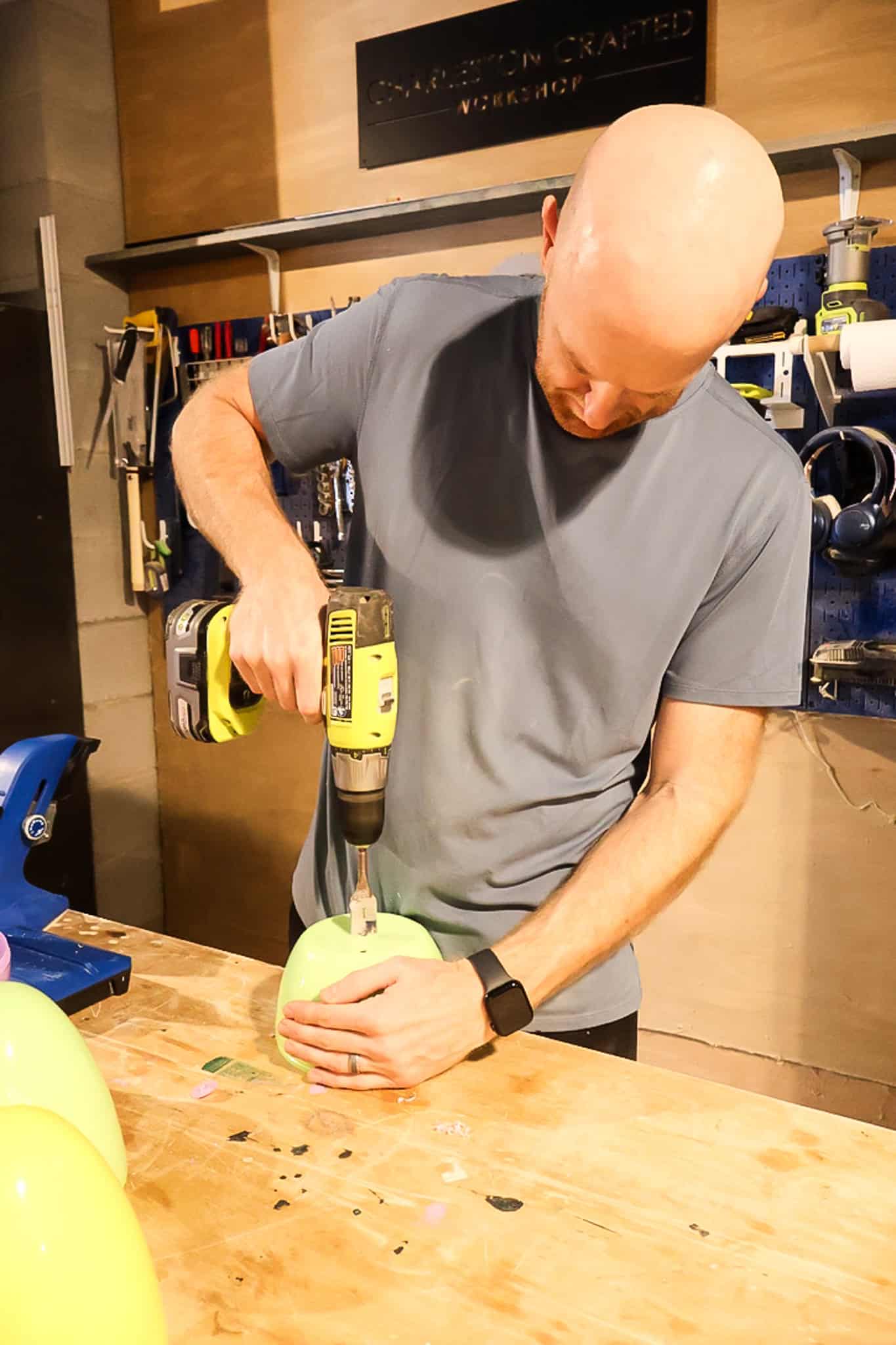 drilling holes into oversized plastic easter eggs