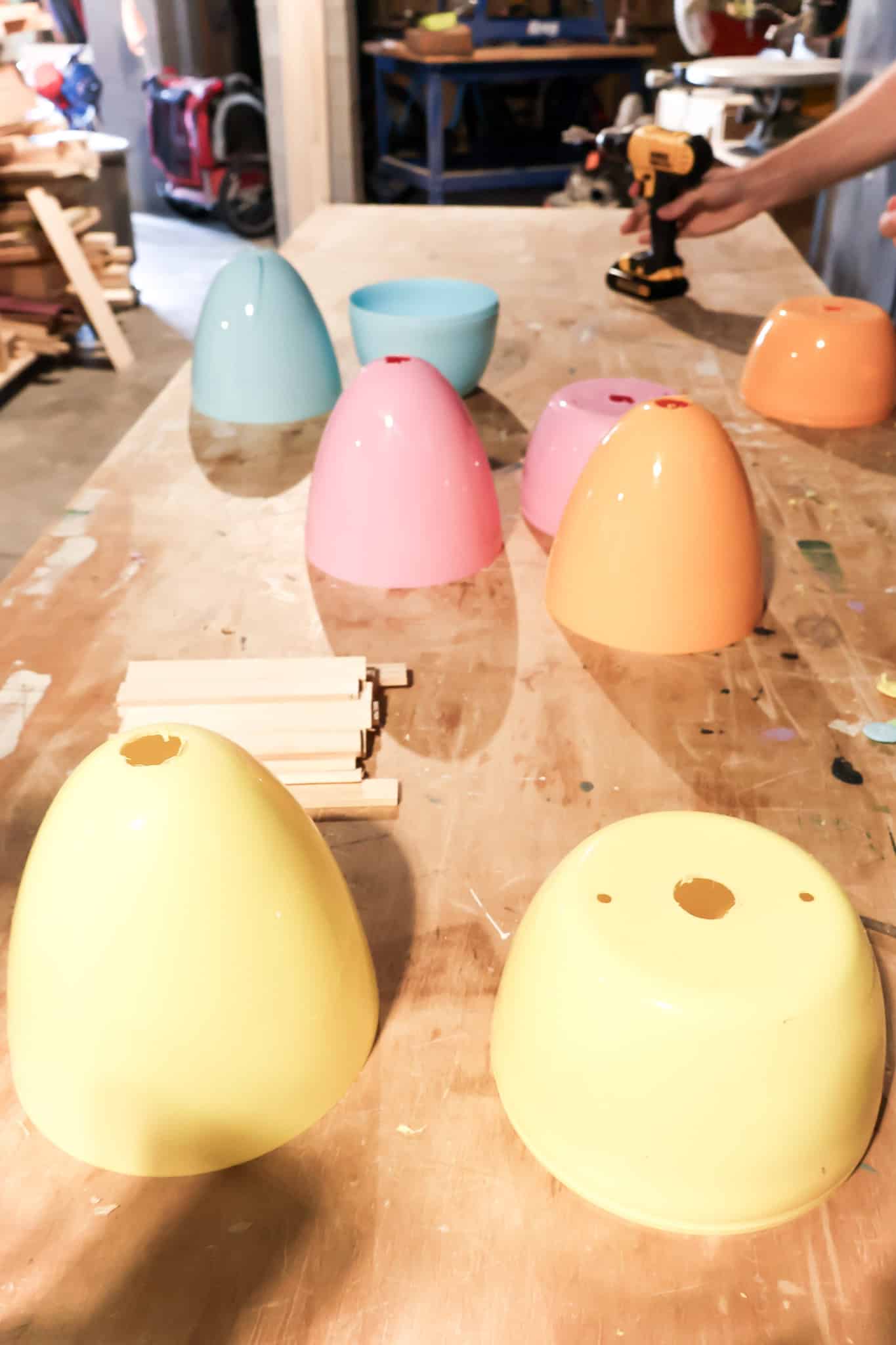 drilling holes into oversized plastic easter eggs