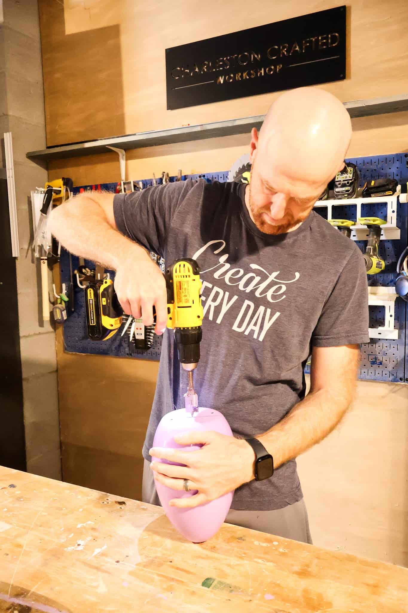 drilling holes into oversized plastic easter eggs